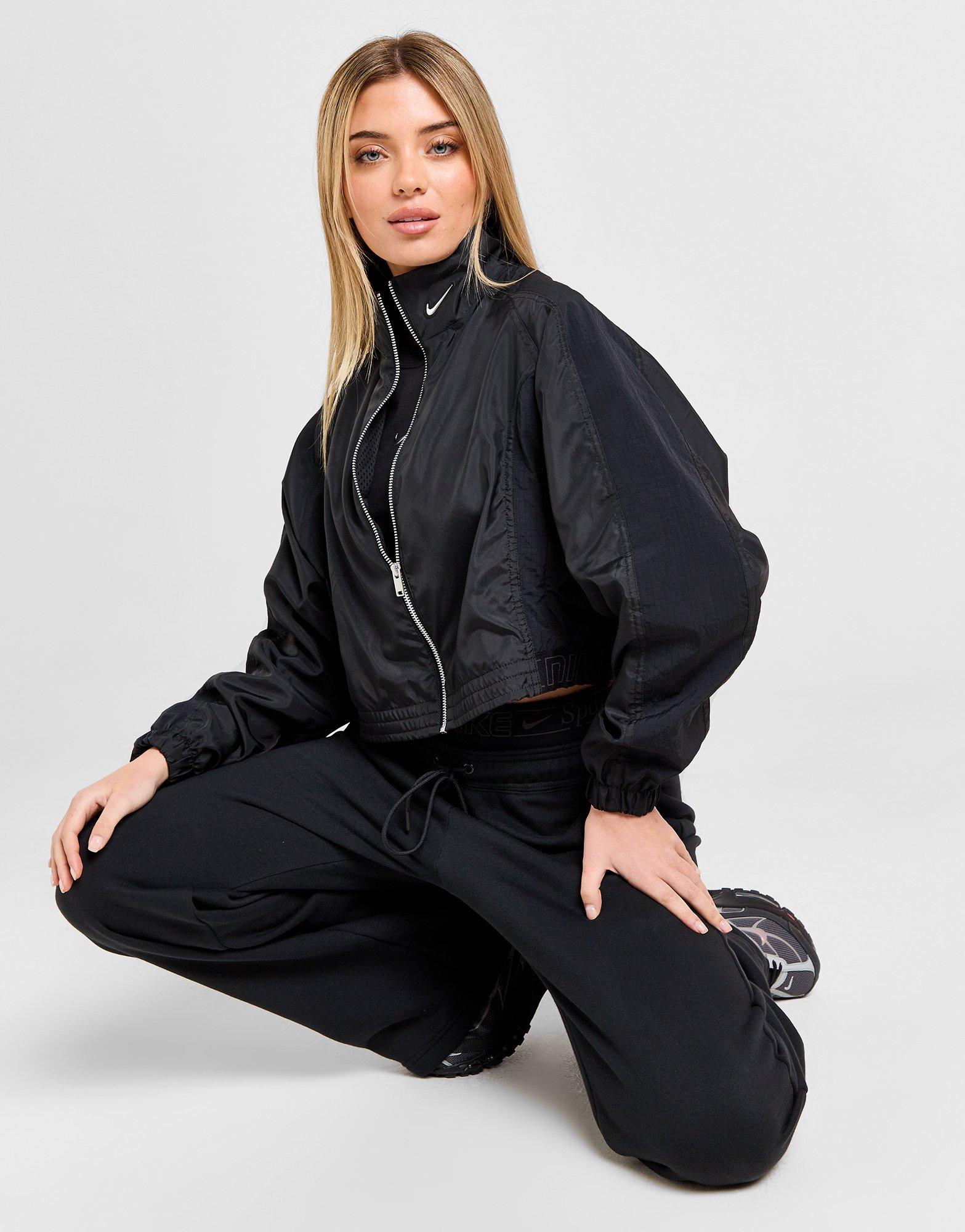 nike swoosh plus woven jacket in black with utility pockets